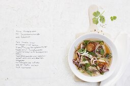 Oriental noodle soup with scallops and calamari