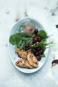 Sour cherry salad with roast guinea fowl