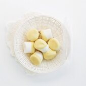 Marshmallows dipped in white chocolate