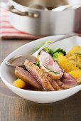 Roast duck breast with oranges and duck sauce