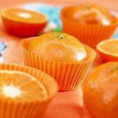 Halved clementines in muffin cups