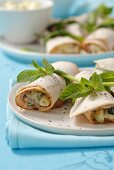 Turkey wraps filled with vegetables and mayonnaise