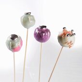Cake pops with pastel colored and silver pearls