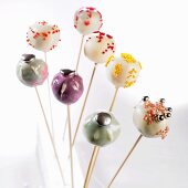 Eight different decorated cake pops