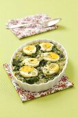 Spinach bake with egg and parmesan