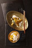 Caramelized bananas in coconut milk and sticky rice with mango (Thailand)