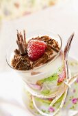 Mascarpone cream with raspberries, kiwis and chocolate curls
