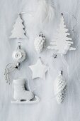 Assorted Christmas tree decorations in white
