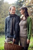 A couple with a picnic basket