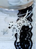 A Dalmatian figurine as table decoration for Christmas