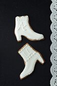 Boot-shaped biscuits with white icing