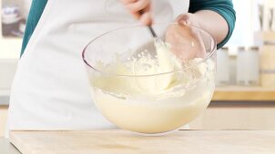 Egg whites being mixed with mascarpone cream