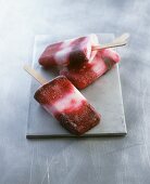 Home-made raspberry and blackberry ice lollies