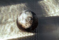 One Truffle with Powdered Sugar