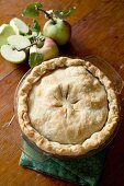 Whole apple pie in the baking tin