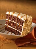 Slice of carrot cake with caramel sauce