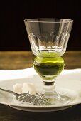 Glass of Absinthe; Absinthe Spoon and Sugar