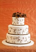 Brown and White Tiered Wedding Cake