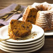Piece of Pumpkin Nut Spice Cake on Stacked Plates