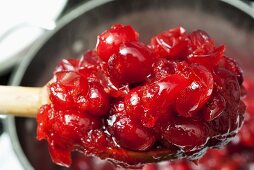 Making Homemade Cranberry Sauce; Spoonful Above Pan