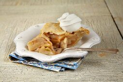 Piece of Apple Pie with Whipped Cream and a Fork