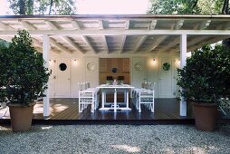 Stage production on a white covered wooden terrace