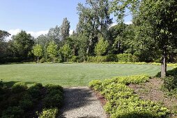 Freshly mowed circular lawn in the garden