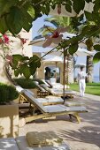 A lounger on a Mediterranean terrace