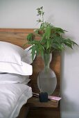 Leaf arrangement on built in bedside table