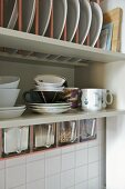 Plate rack and tableware on shelf