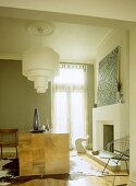 Retro ceiling light suspended over wooden table