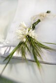 Place setting decoration for a wedding - Spanish bluebells and meadow grass flowers