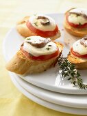 Crostini with anchovies, tomatoes and mozzarella