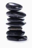 Black stones, in a pile, for LaStone Therapy