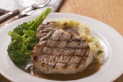 Grilled pork chop with broccoli and mashed potato
