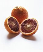 A Halved and Whole Blood Orange
