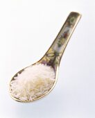 A Spoonful of Uncooked Long Grain White Rice