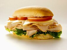 A Turkey Sub with Tomatoes, Cheese and Lettuce