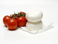 Two Balls of Mozzarella with Several Vine Ripened Tomatoes