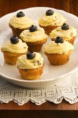 Passion fruit cupcakes with blueberries