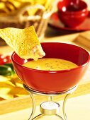 Cheese fondue with tortilla chips