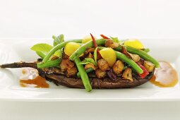 Stuffed aubergines with beans and tamarind sauce (Asia)