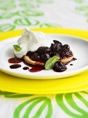 Mini cherry tart with whipped cream