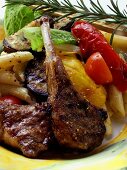 Barbecued lamb chops with pasta, vegetables and rosemary