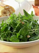 Mangetout salad with cress and bacon; white bread