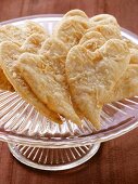 Parmesan hearts on glass plate