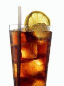 Cola with ice cubes, slice of lemon and straw in glass