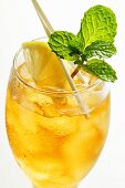 Cold peppermint tea with fresh mint and lemon