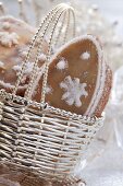 Orange biscuits with snow crystals in silver basket