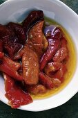 Marinated red peppers with olive oil